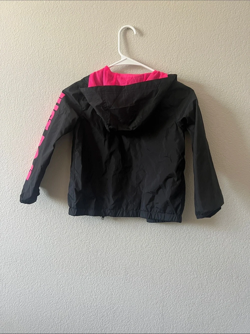 Nike Black Jacket with Bright Pink Lining and Logos
